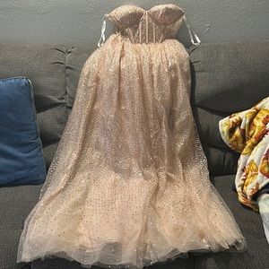 Prom dress from David’s Bridal. It’s a size 4 and the color is rose gold.
